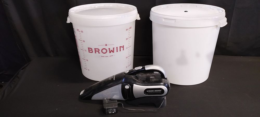Lot 388: Two wine making fermenting buckets and a black...
