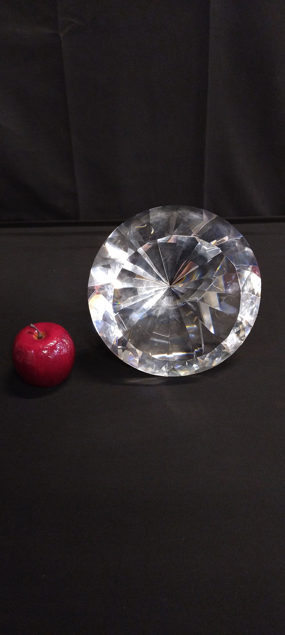 Lot 391: Large faceted Diamond crystal paper Weight with stand....