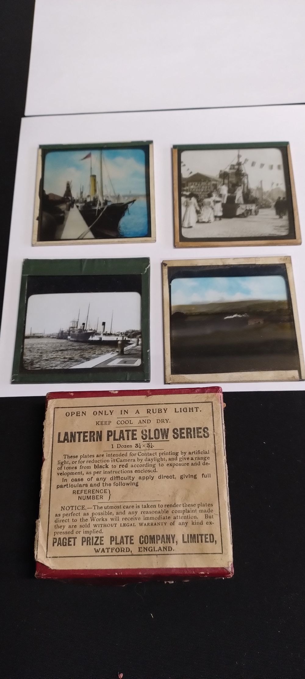 Lot 412: 2 Boxes containing Vintage glass lantern plates