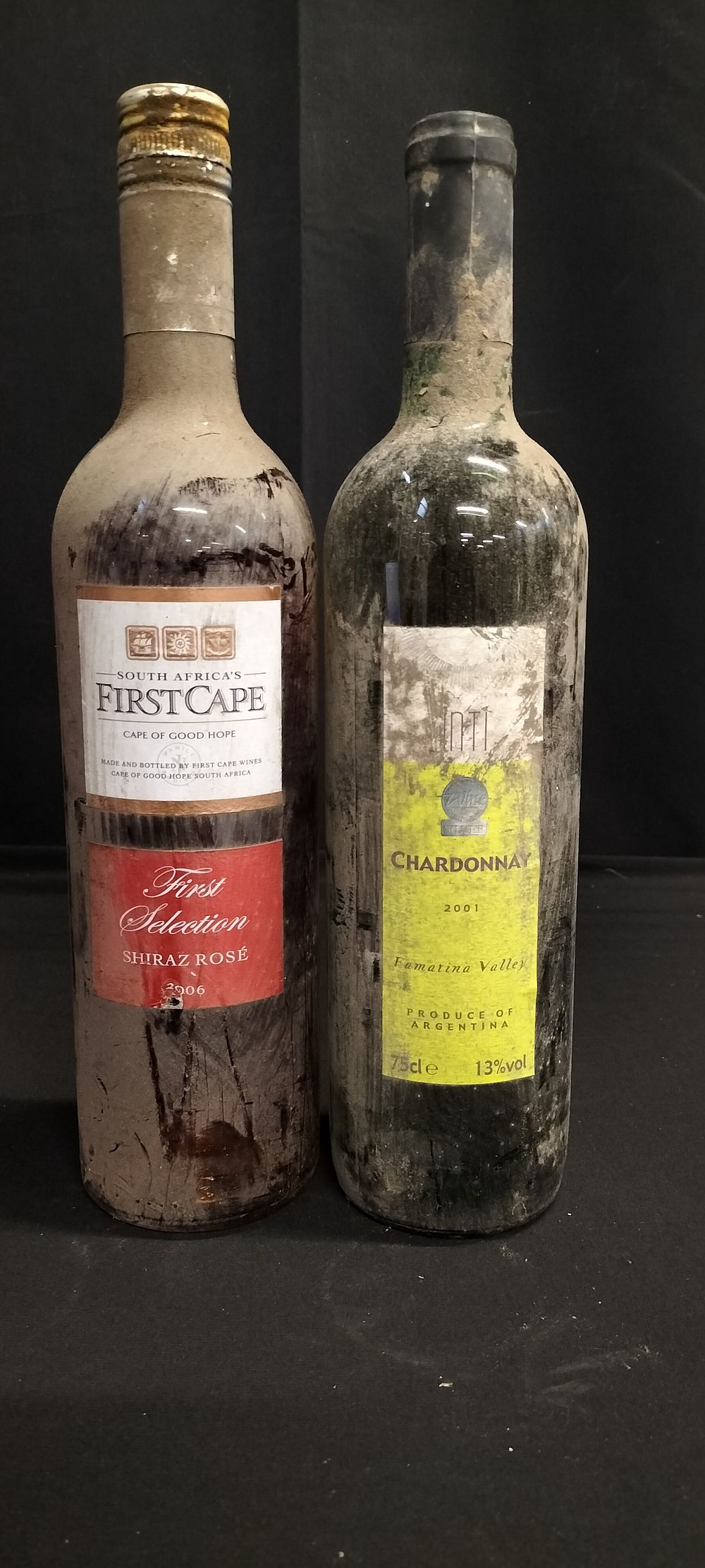 Lot 162: Two bottles of unopened wine. Bottle of 2006...