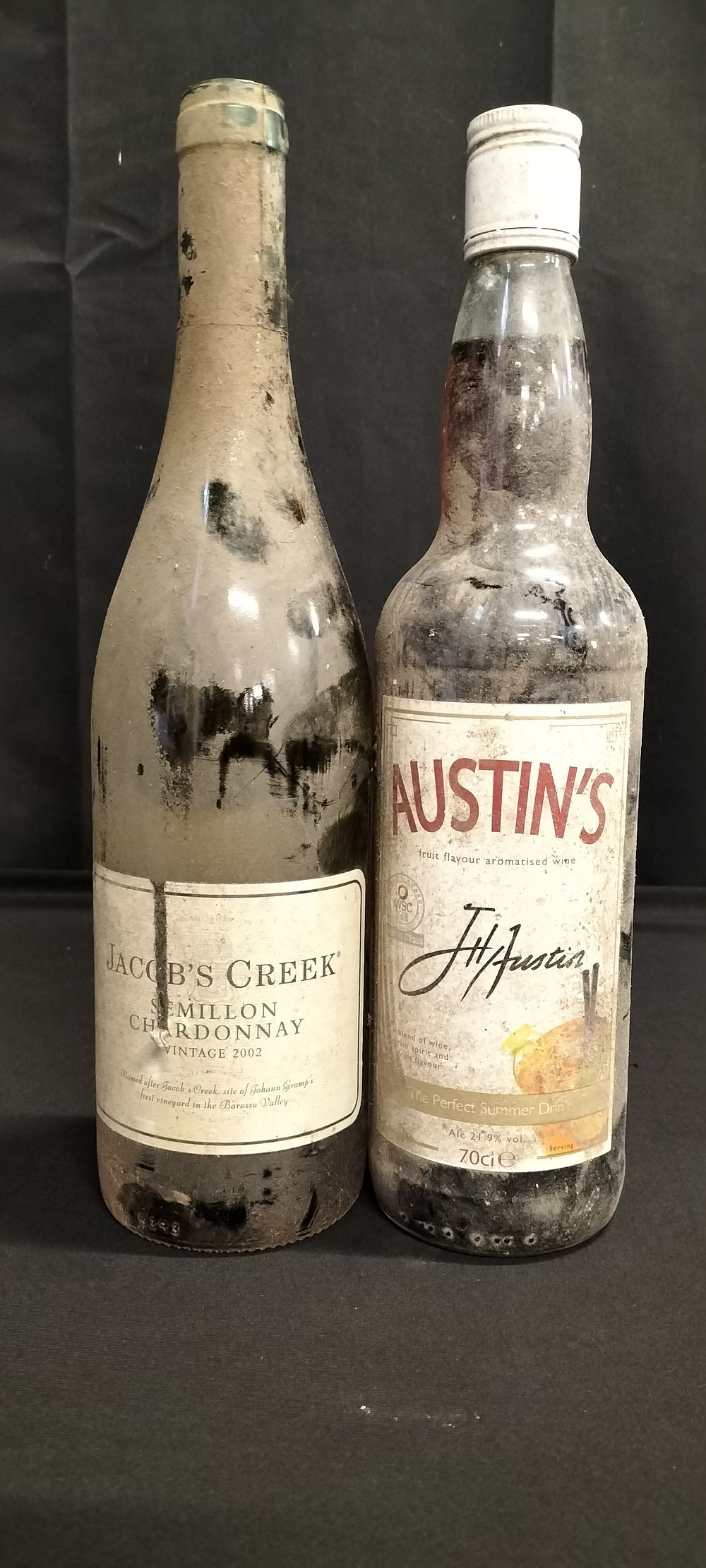 Lot 181: Two unopened bottles of wine. Austin's fruit flavour...