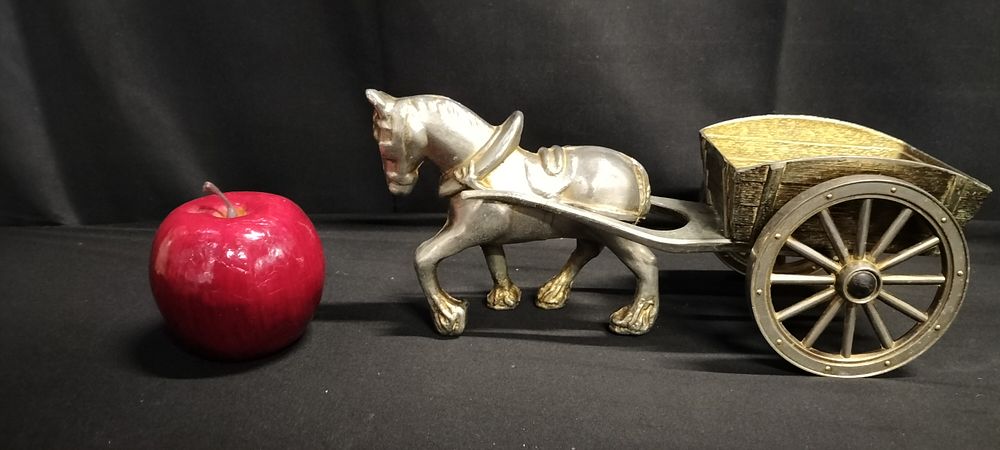 Lot 216: Cast metal horse and cart. Measures approx H...