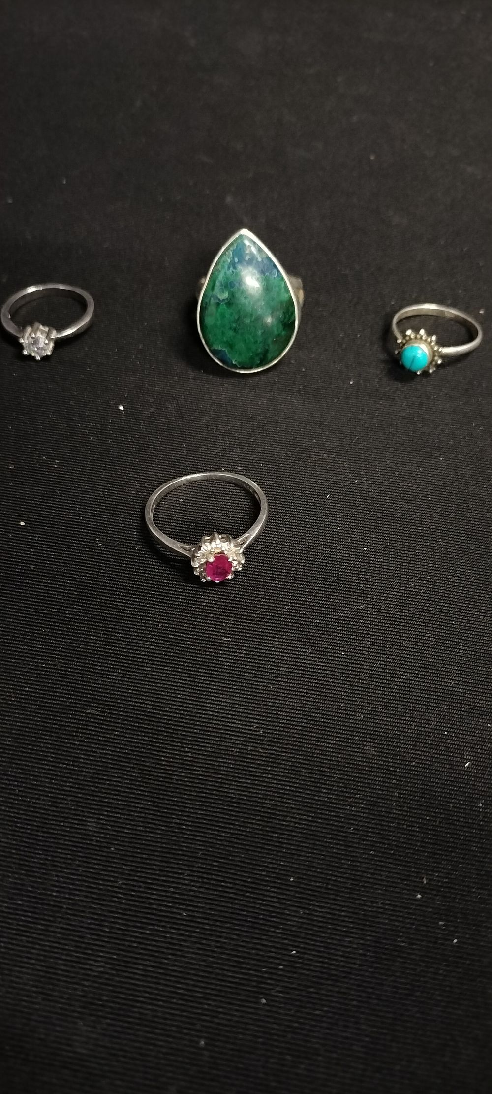 Lot 232: Four sterling silver various sized stone set rings