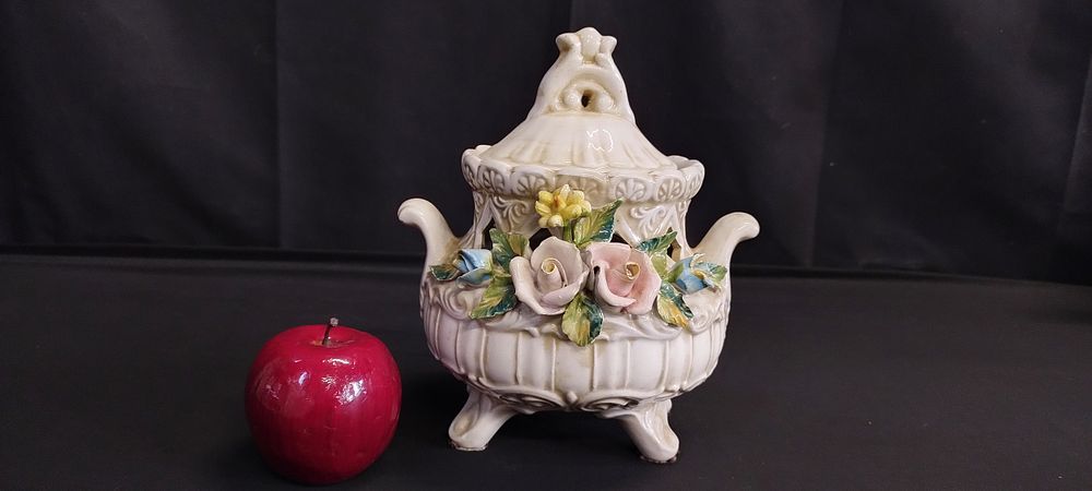 Lot 236: Capodimonte ornamental pot with lid decorated with a...