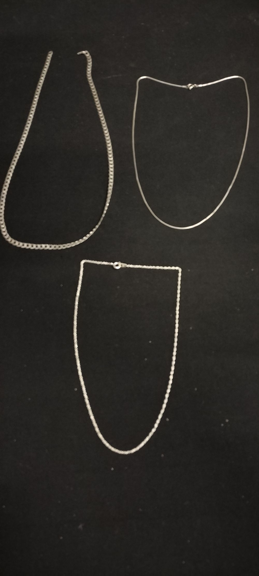 Lot 240: Three sterling silver various designs necklaces