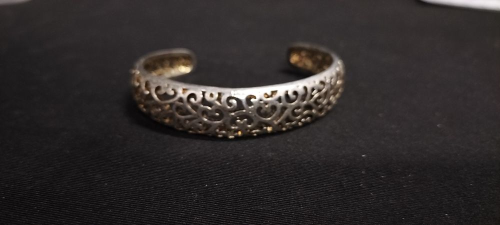 Lot 241: Sterling silver ornate cuff bangle