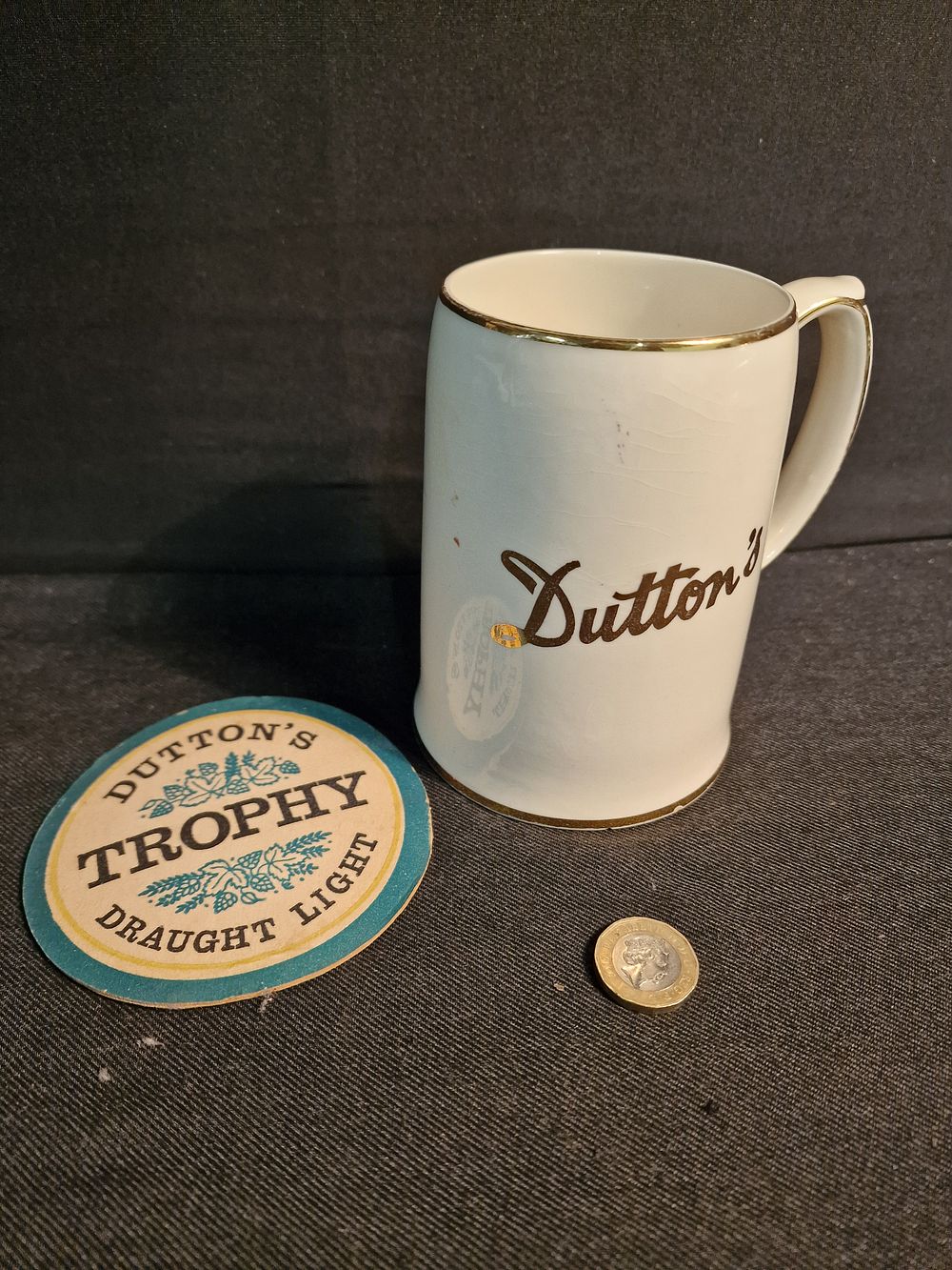 Lot 198: Duttons Tankard by Empire Porcelain Co and Beer Mat
