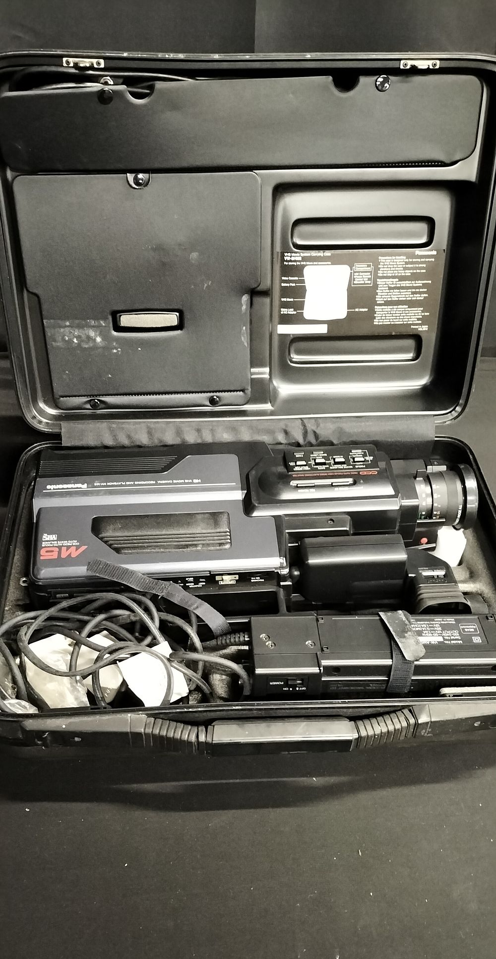 Lot 199: Panasonic M5 VHS movie camcorder with 2 batteries,...