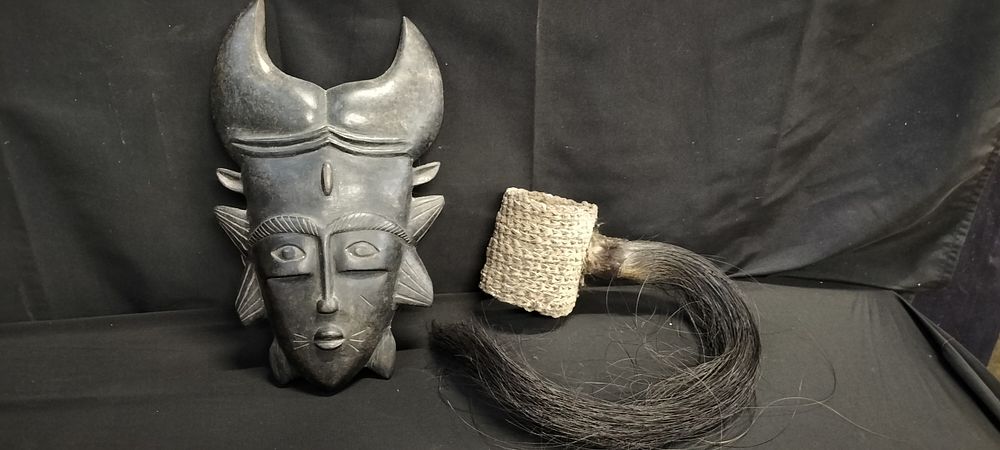 Lot 207: Two africana items a Mask and a ceremonial...