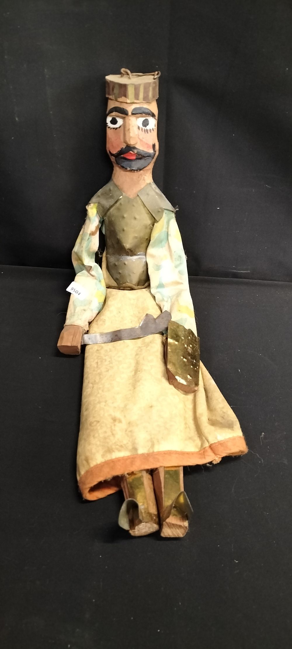 Lot 208: Eastern European marionette Puppet with brass accents