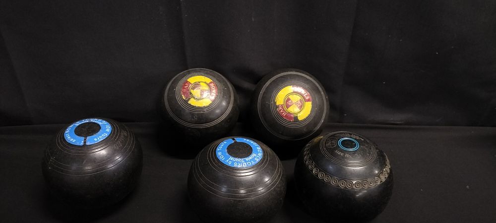 Lot 226: Five lawn bowls,2 Harold Hill Bowls.and 3 others
