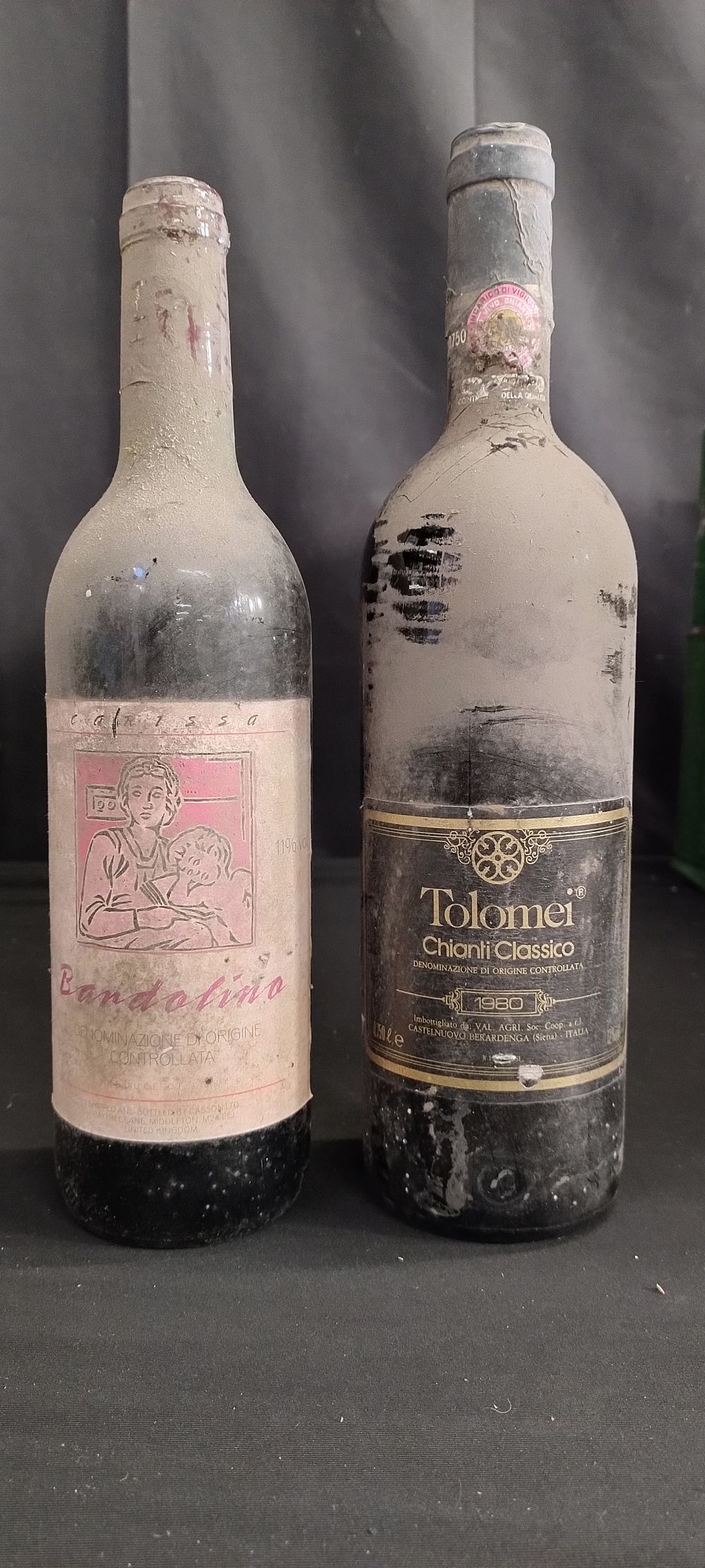 Lot 247: Two bottles of unopened red wine. 1983 Tolomei...