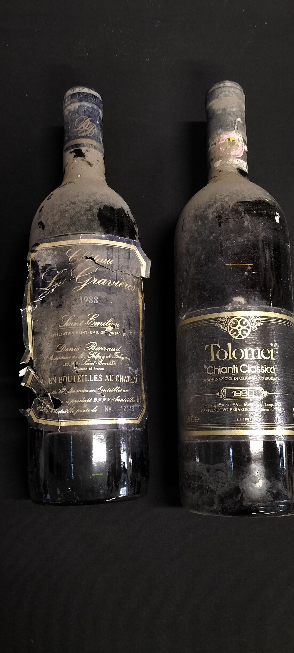 Lot 256: Two unopened bottles of red wine. 1980 Tolomei...
