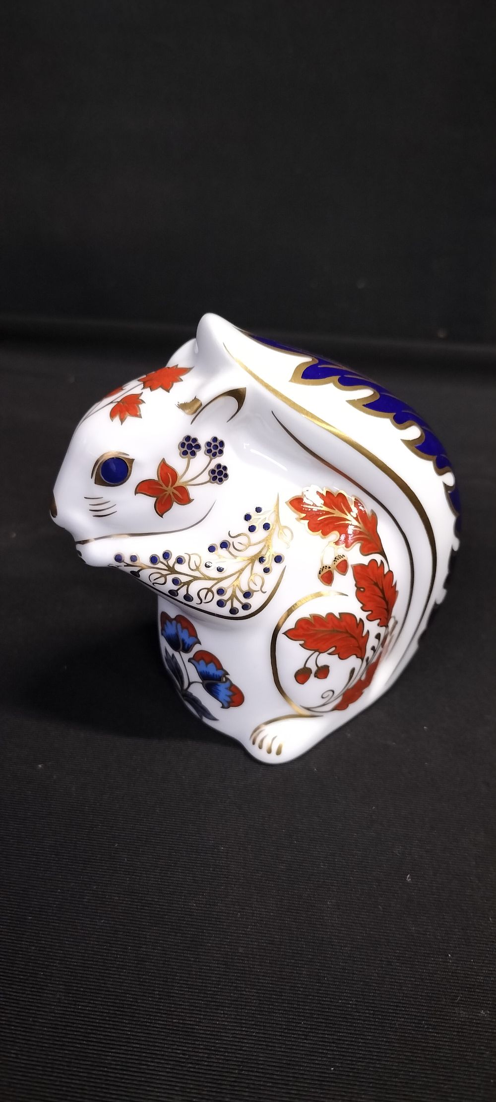 Lot 279: Royal Crown Derby Squirrel with gold button