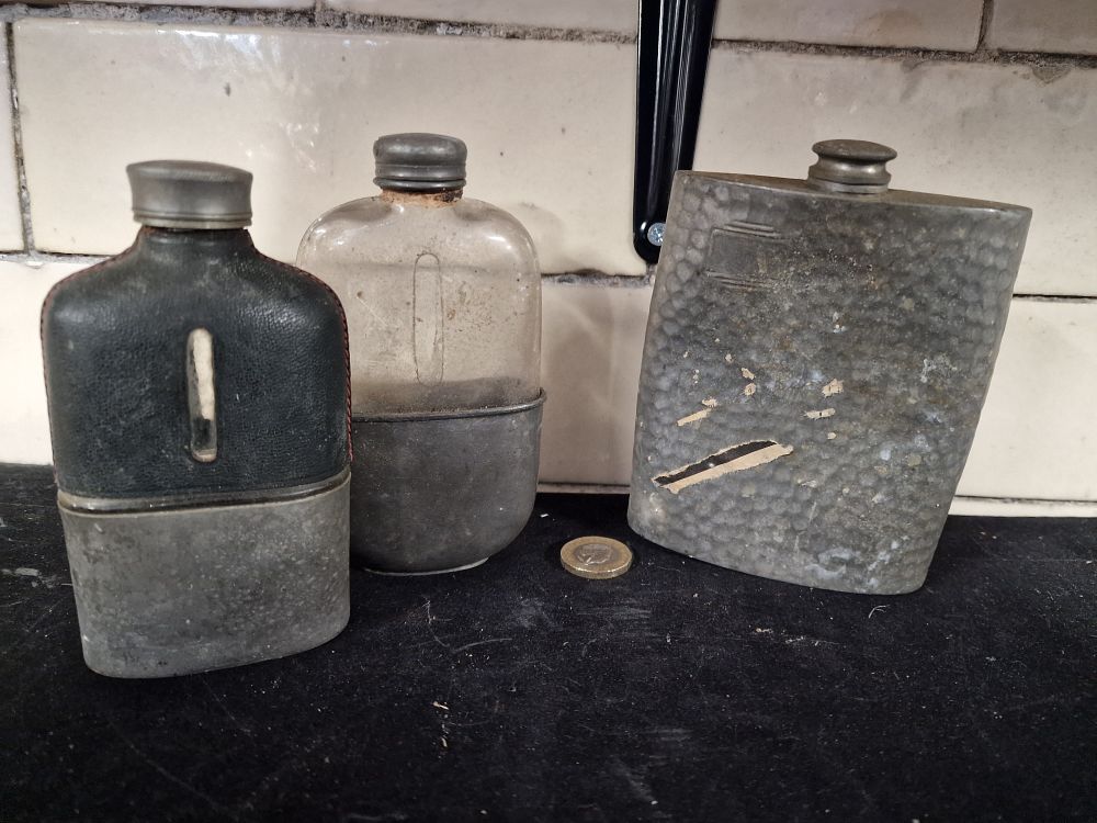 Lot 297: Three Pewter Decanters