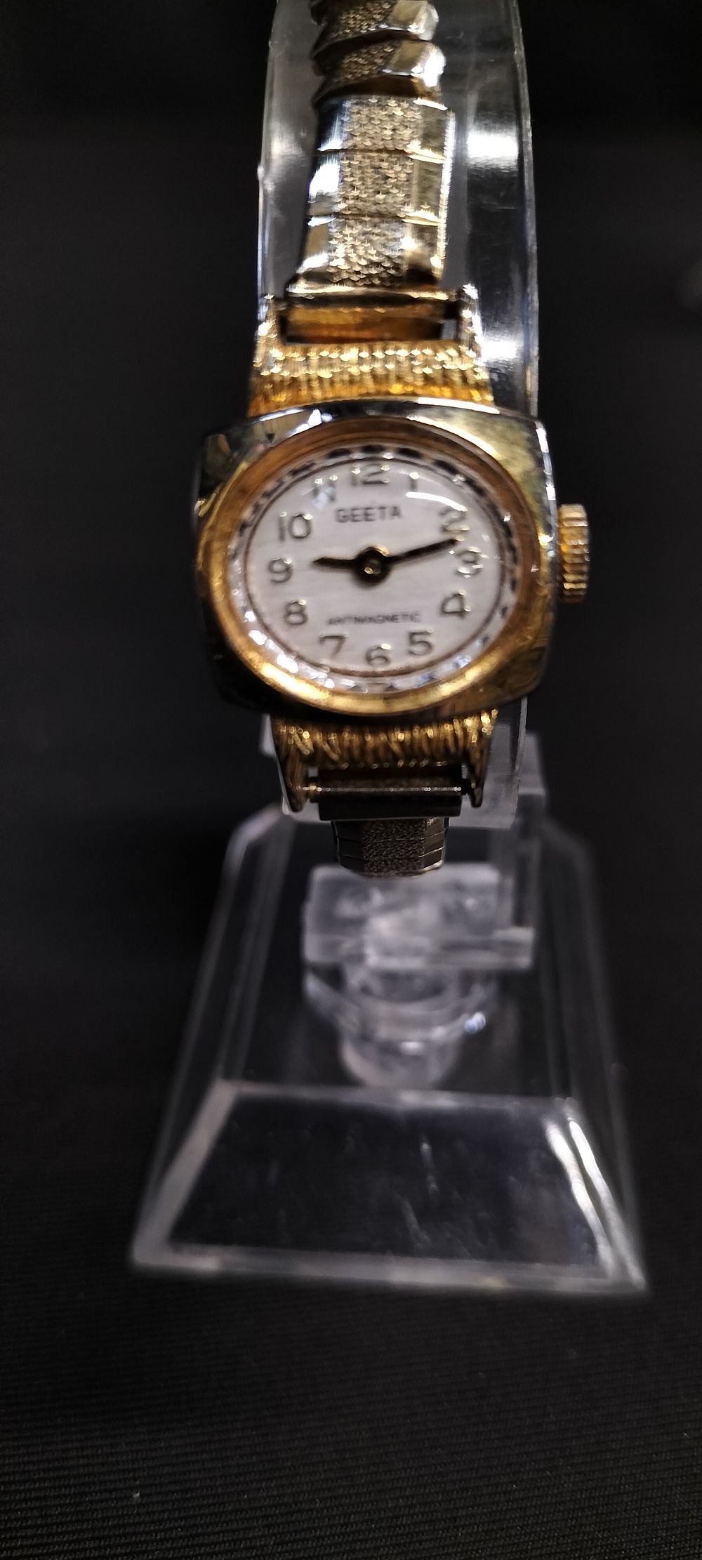 Lot 179: Geeta Ladies gold tone dress watch with stretch...
