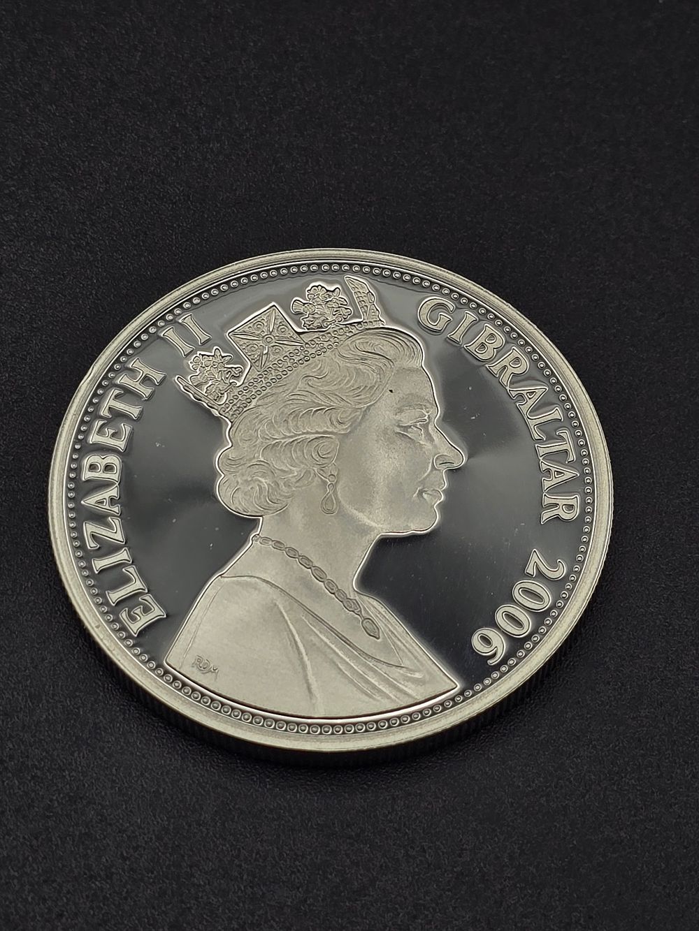 Lot 197: Gibraltar £5 coin - 80th Anniversary- Birth of...