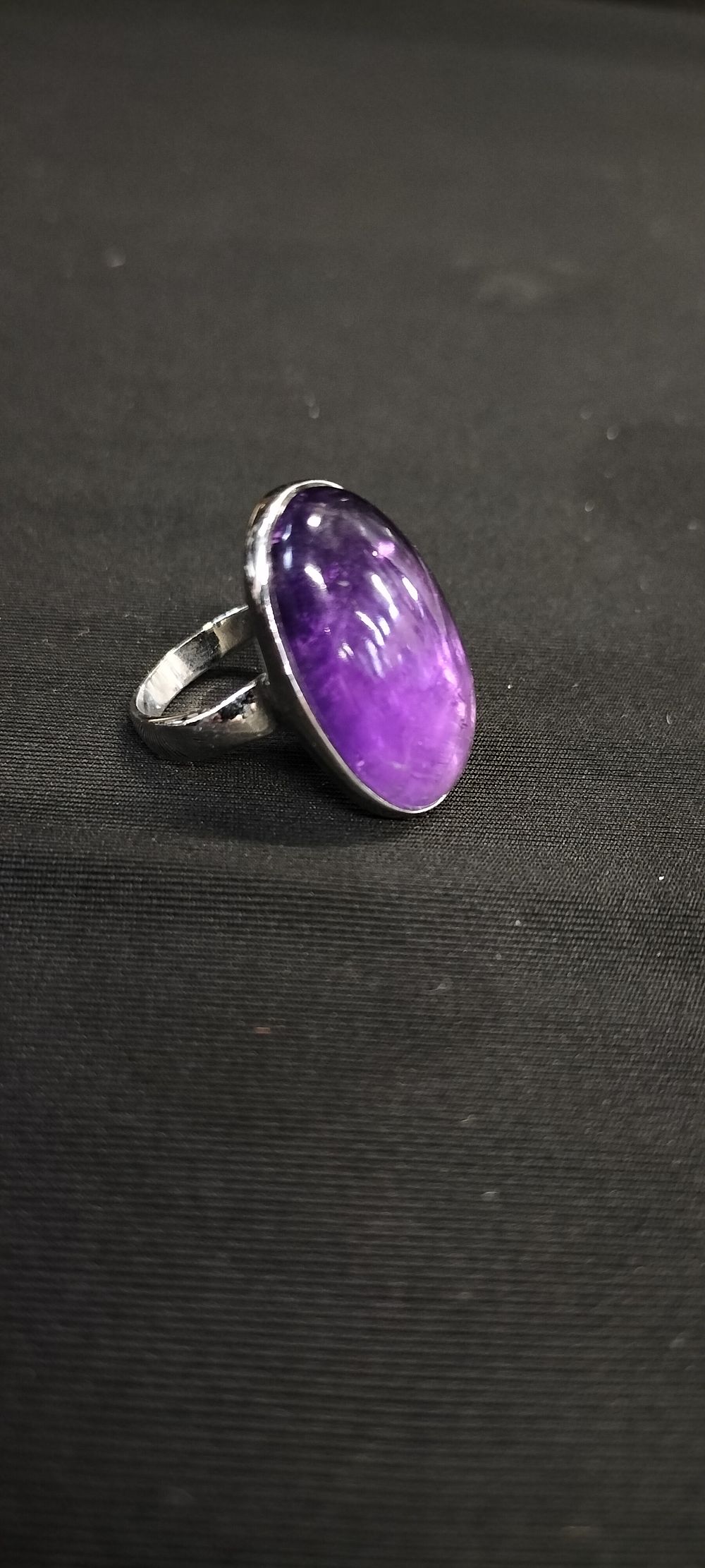 Lot 210: Sterling silver and amethyst ring size N/O