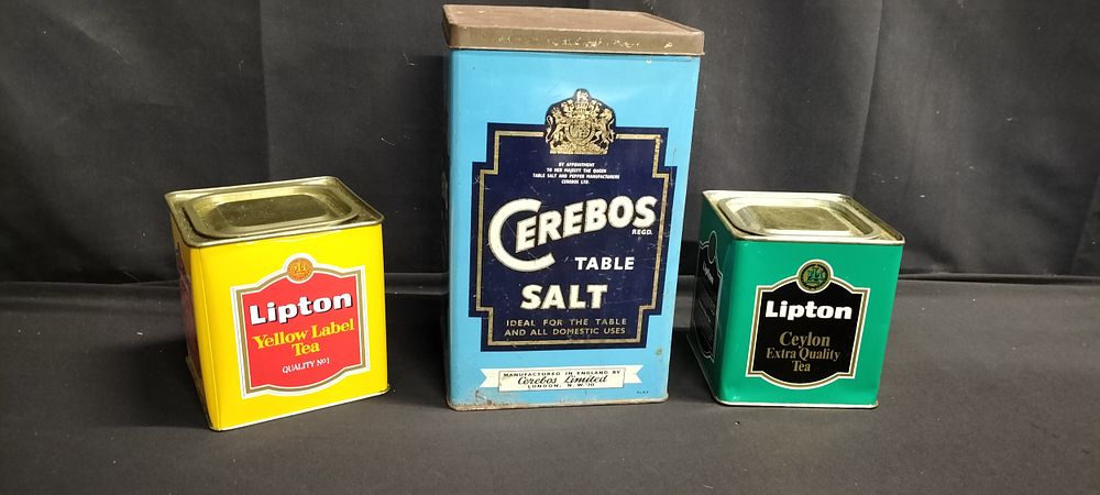 Lot 214: Three various tins, two Lipton tea tins and...