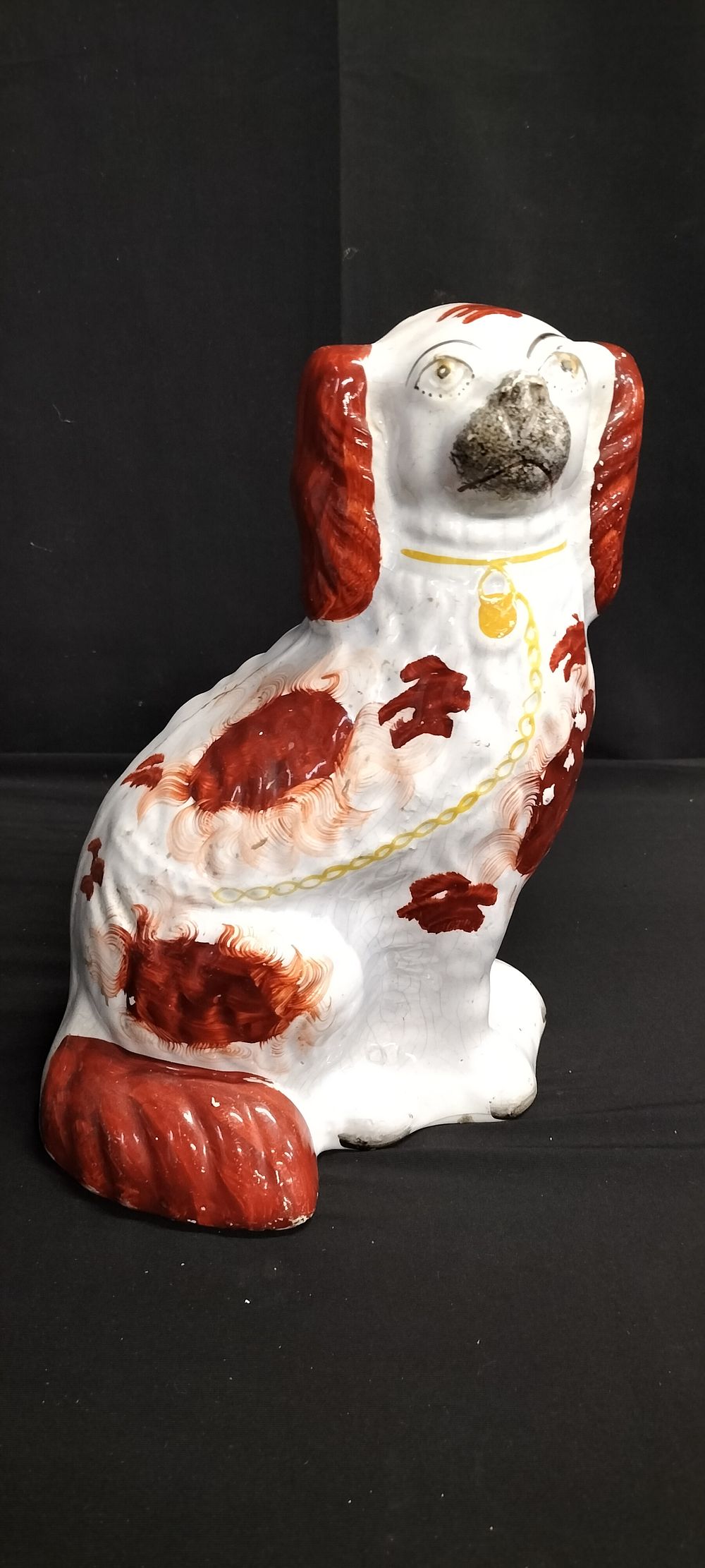 Lot 219: Possible Staffordshire pottery style mantle dog in the...