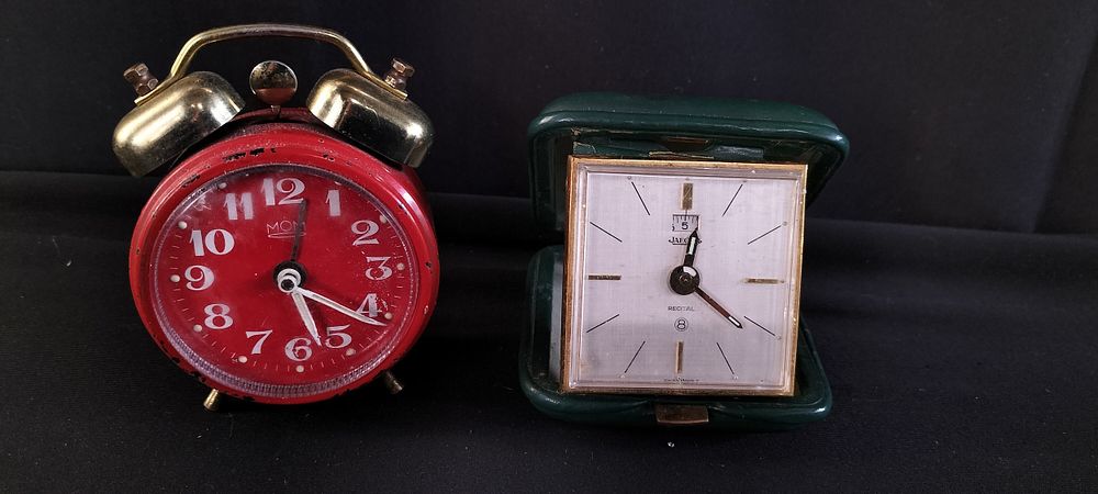 Lot 233: Two vintage clocks, a red MOM alarm clock...