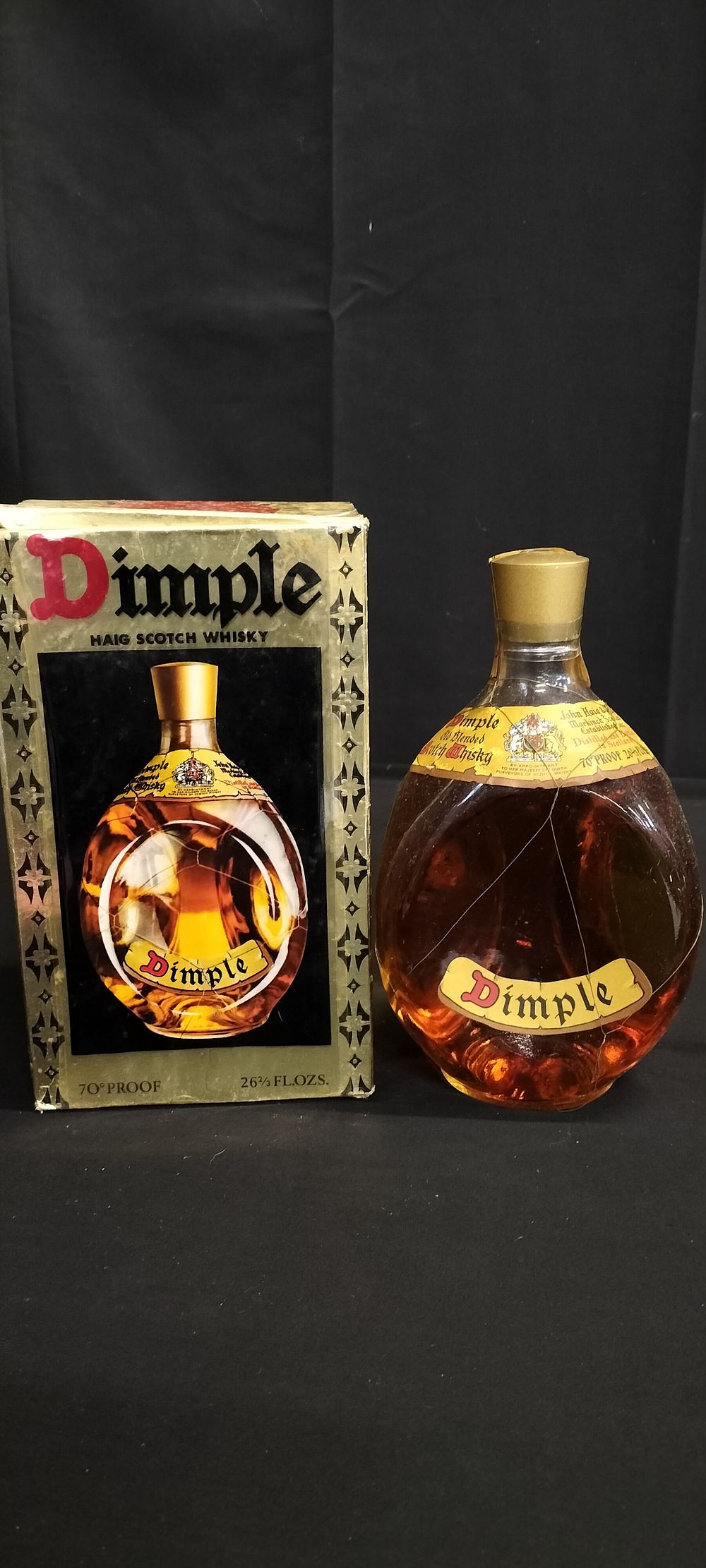 Lot 250: Boxed unopened 1970's bottle of Haig Dimple bottle...