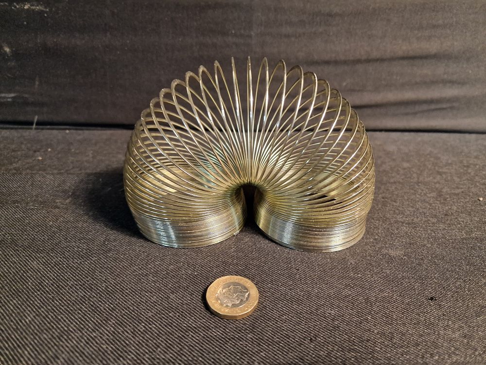 Lot 216: Metal Slinky