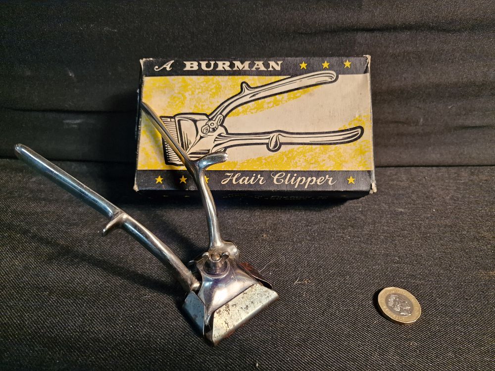 Lot 231: Vintage Burman Hand Held Hair Clippers in Box