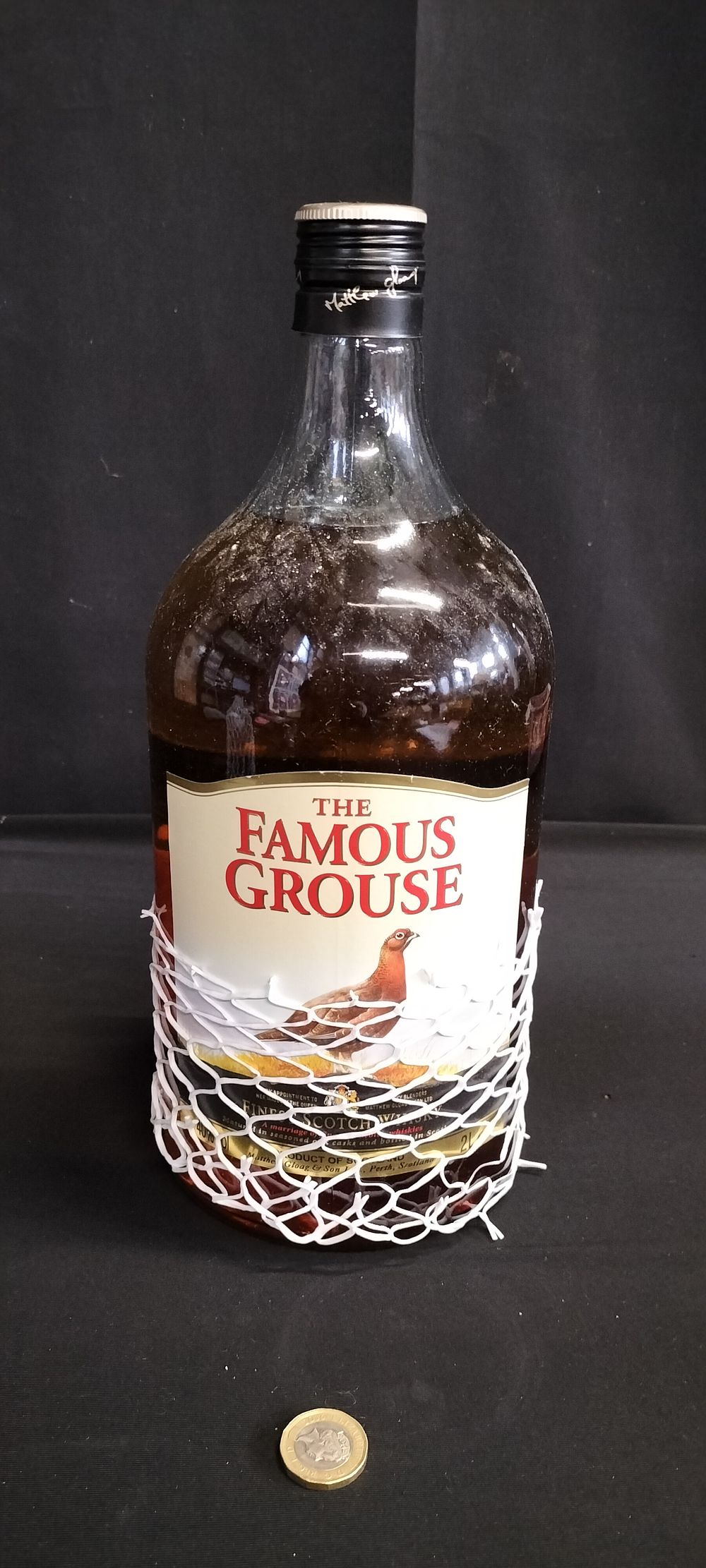 Lot 258: Unopened 2ltr bottle of Famous Grouse Whisky