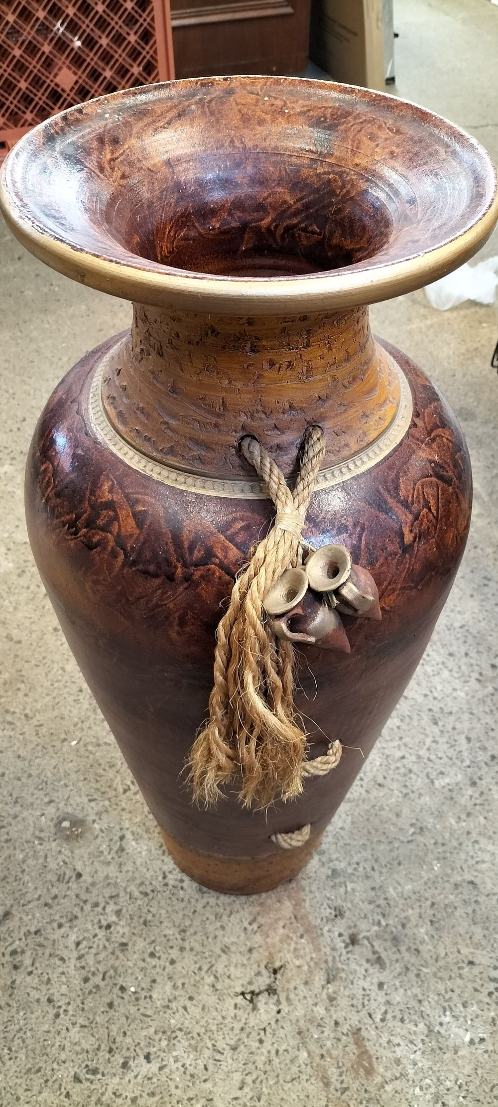 Lot 298: Large Grecian style vase with rope detail. Measures...