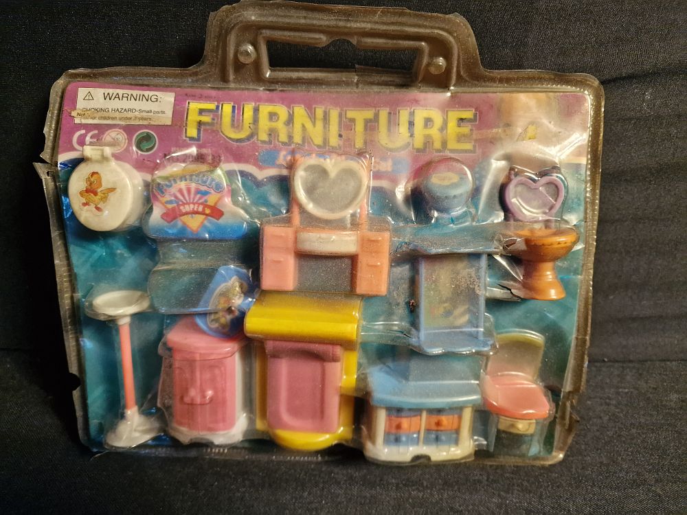 Lot 290: Plastic Dolls House Furniture