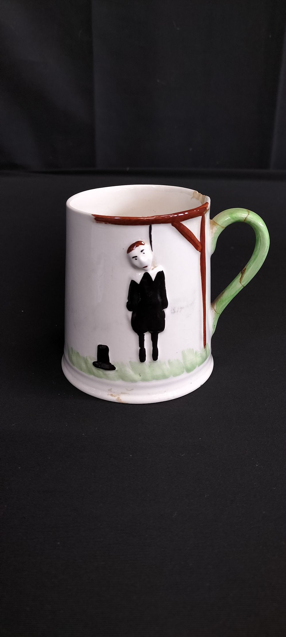 Lot 308: 1940's Carlton ware Hang man's cup with macabre...