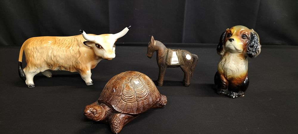 Lot 310: Collection of animal ornaments, bull, tortoise,dog and wooden...