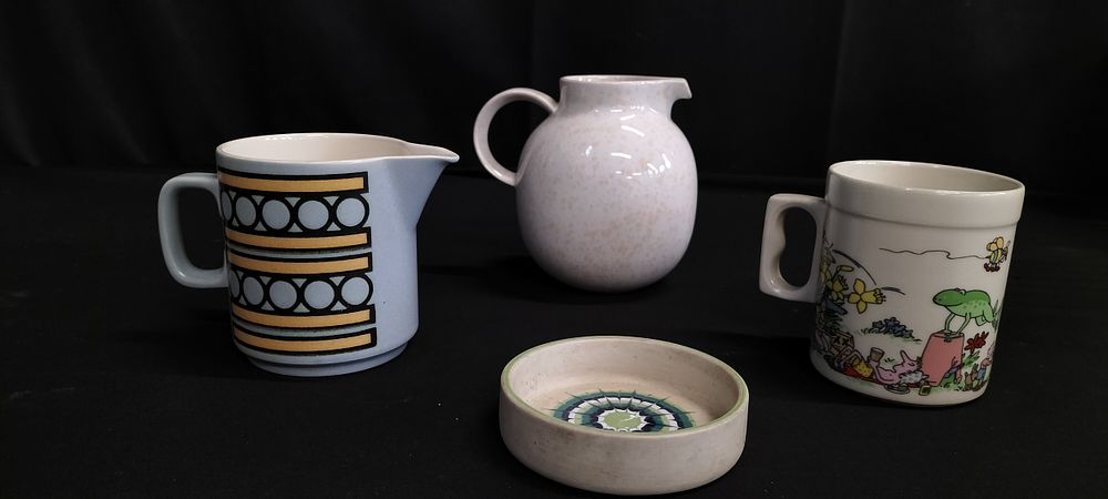 Lot 312: Four Hornsea pottery items including cup, milk jug,...