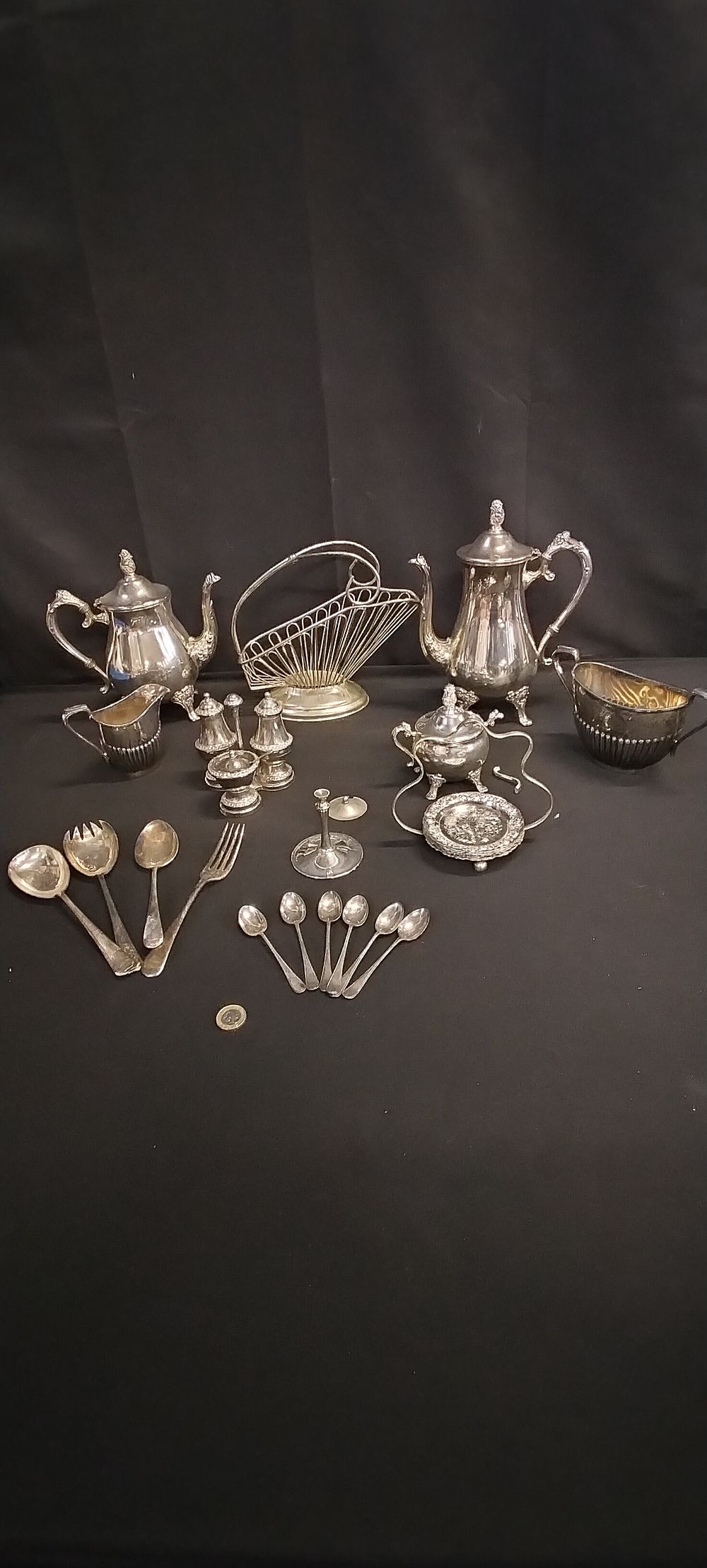 Lot 319: Collection of silver plate, including tea and coffee...