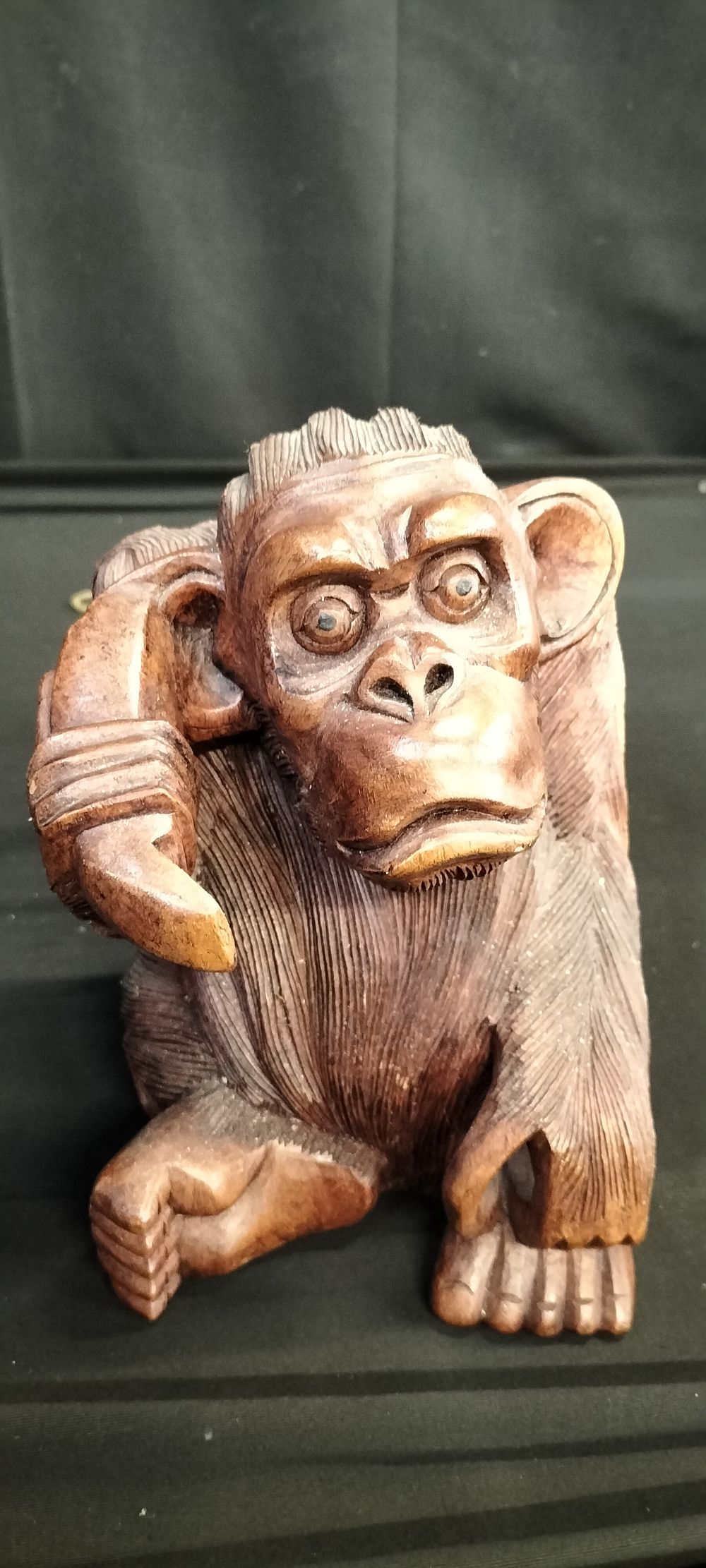 Lot 322: Bali Solid wood orangutan with a banana to...