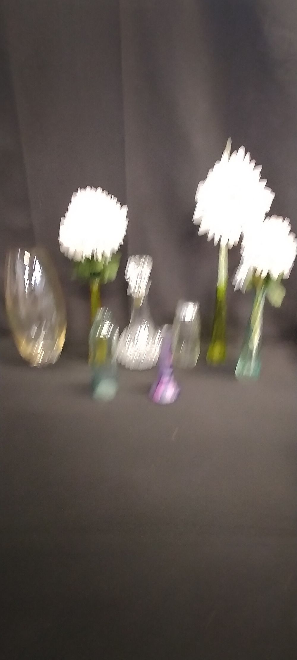 Lot 333: Various glass vases with faux flowers and a...