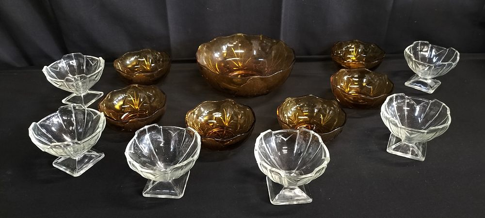 Lot 348: amber-colored Anchor Hocking salad bowl set, mid-20th century....