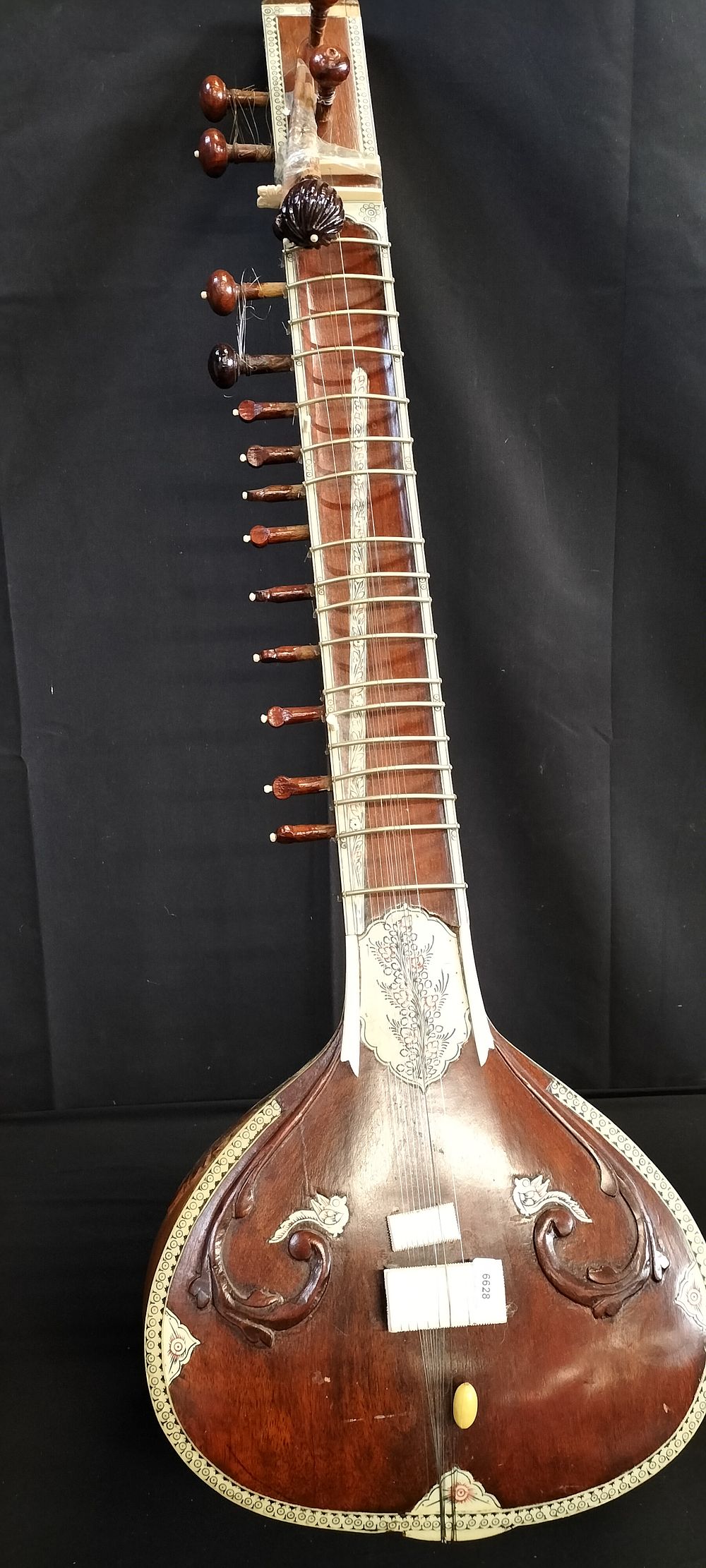 Lot 351: Hindustani classical 9 string sitar with ornate detailing...