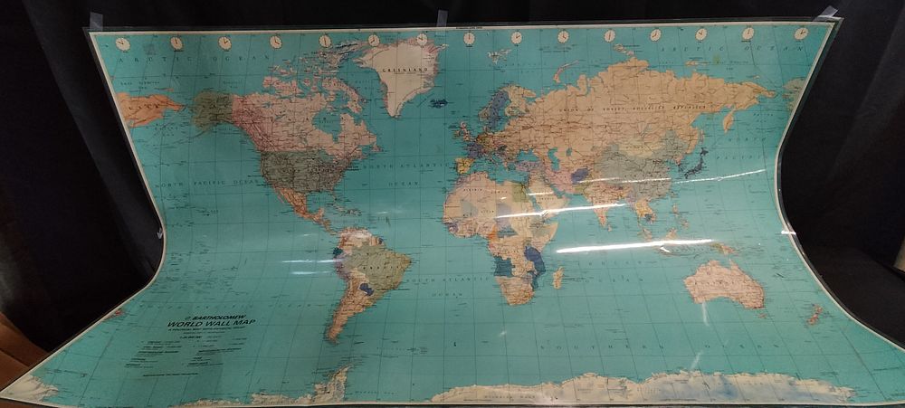 Lot 355: Bartholomew World Wall Map. Measures approx H 94...
