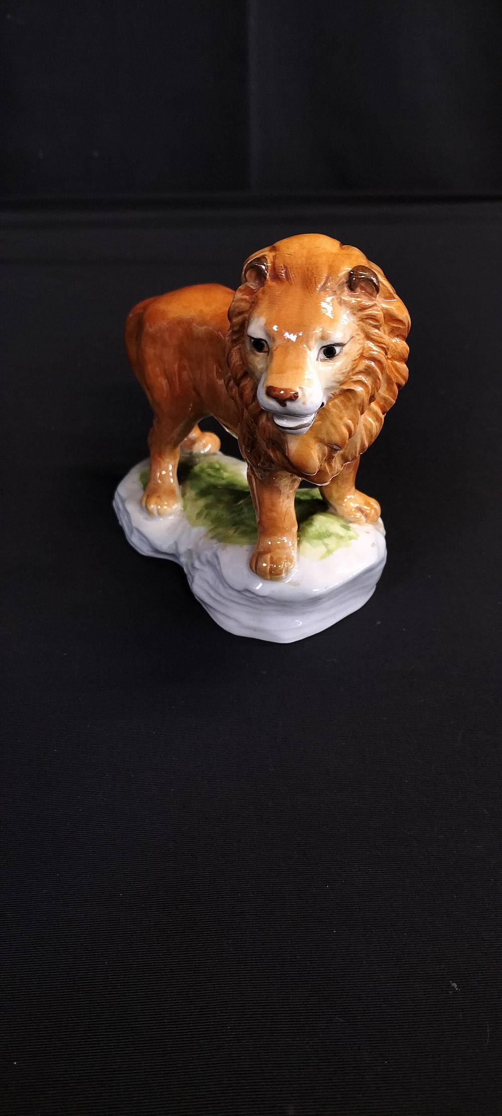 Lot 357: 1930's German Sitzendorf, Porcelain figurine of a lion...