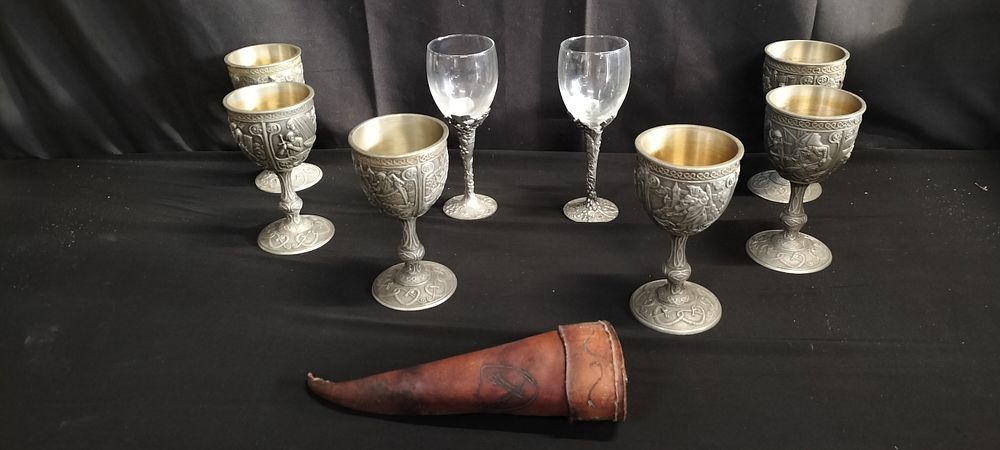 Lot 370: Six pewter Excalibur goblets by the Franklin mint....
