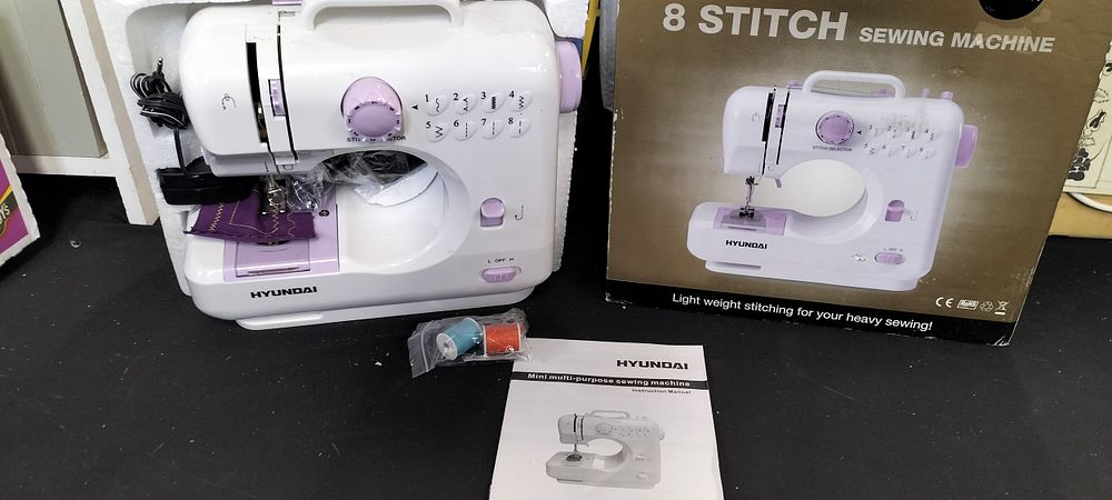 Lot 387: Boxed Hyundai mini multi purpose sewing machine