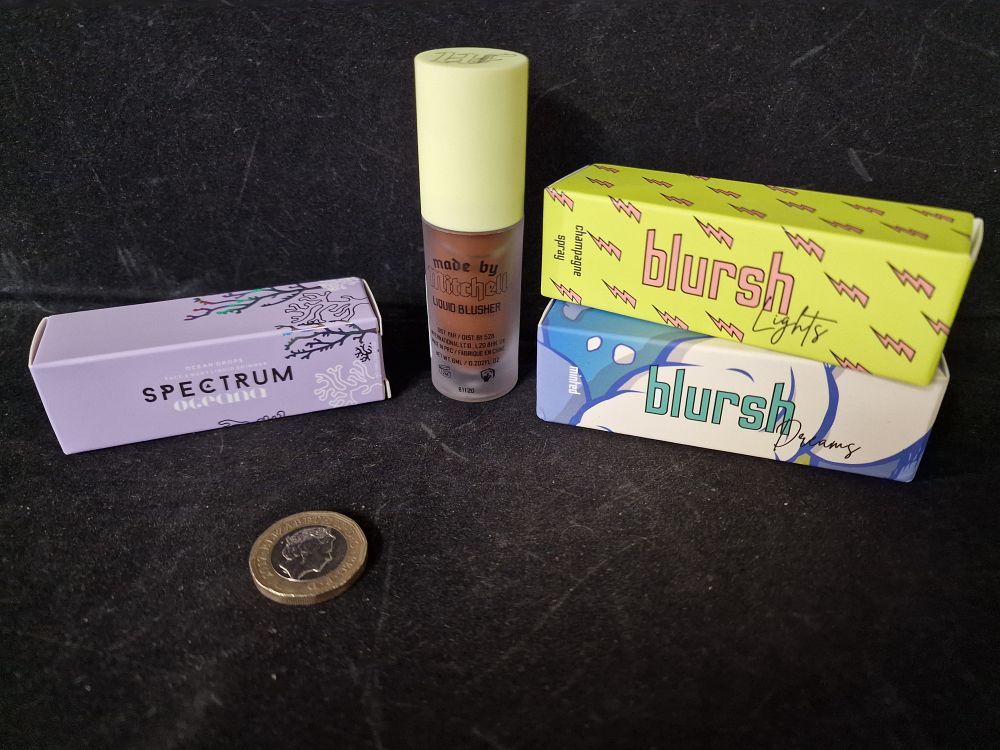 Lot 327: Made by Mitchell, Oceana.New Blush Liquid Blushers & Highlighter and a Spectrum Oceana Face and Body Liquid Shimmer