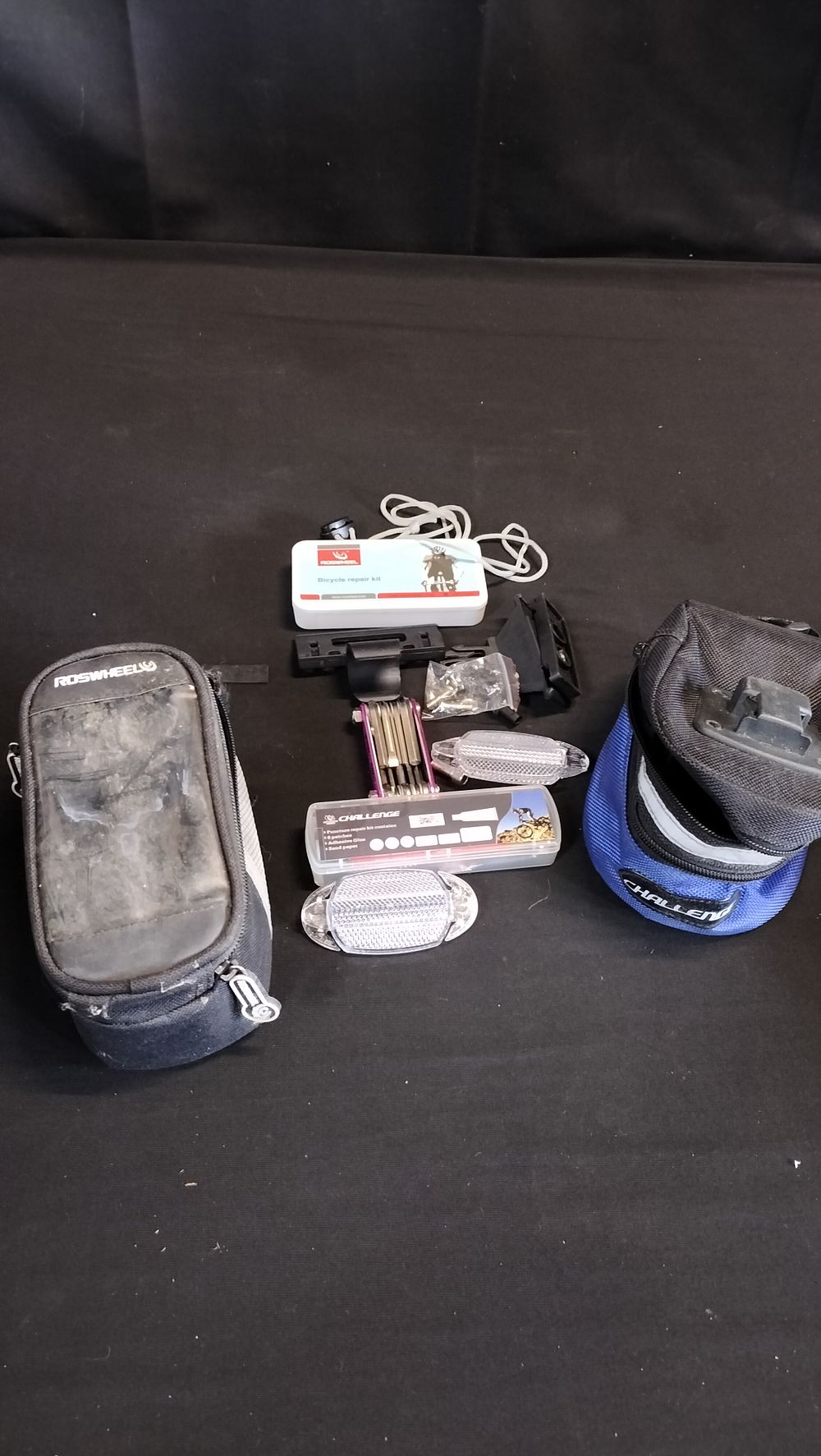 Lot 551: Two bike tool bags one with phone holder 