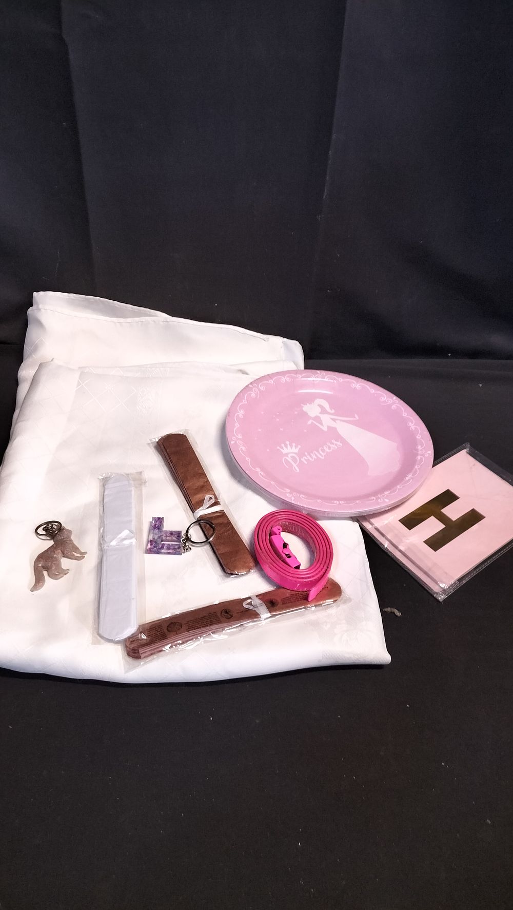 Lot 572: Table cloth and party tableware and other items 
