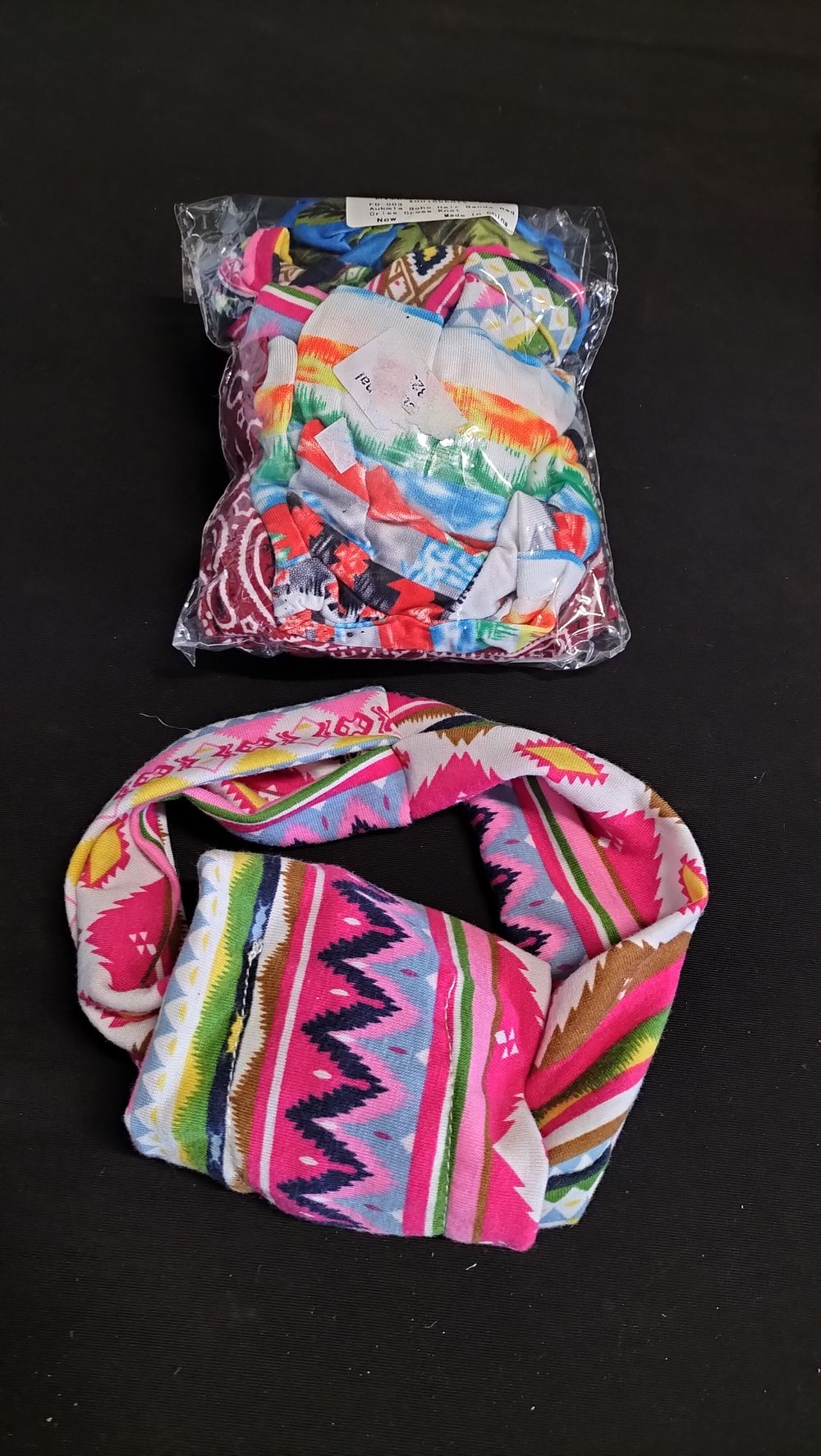 Lot 573: Bag of mixed coloured Boho hair bands 