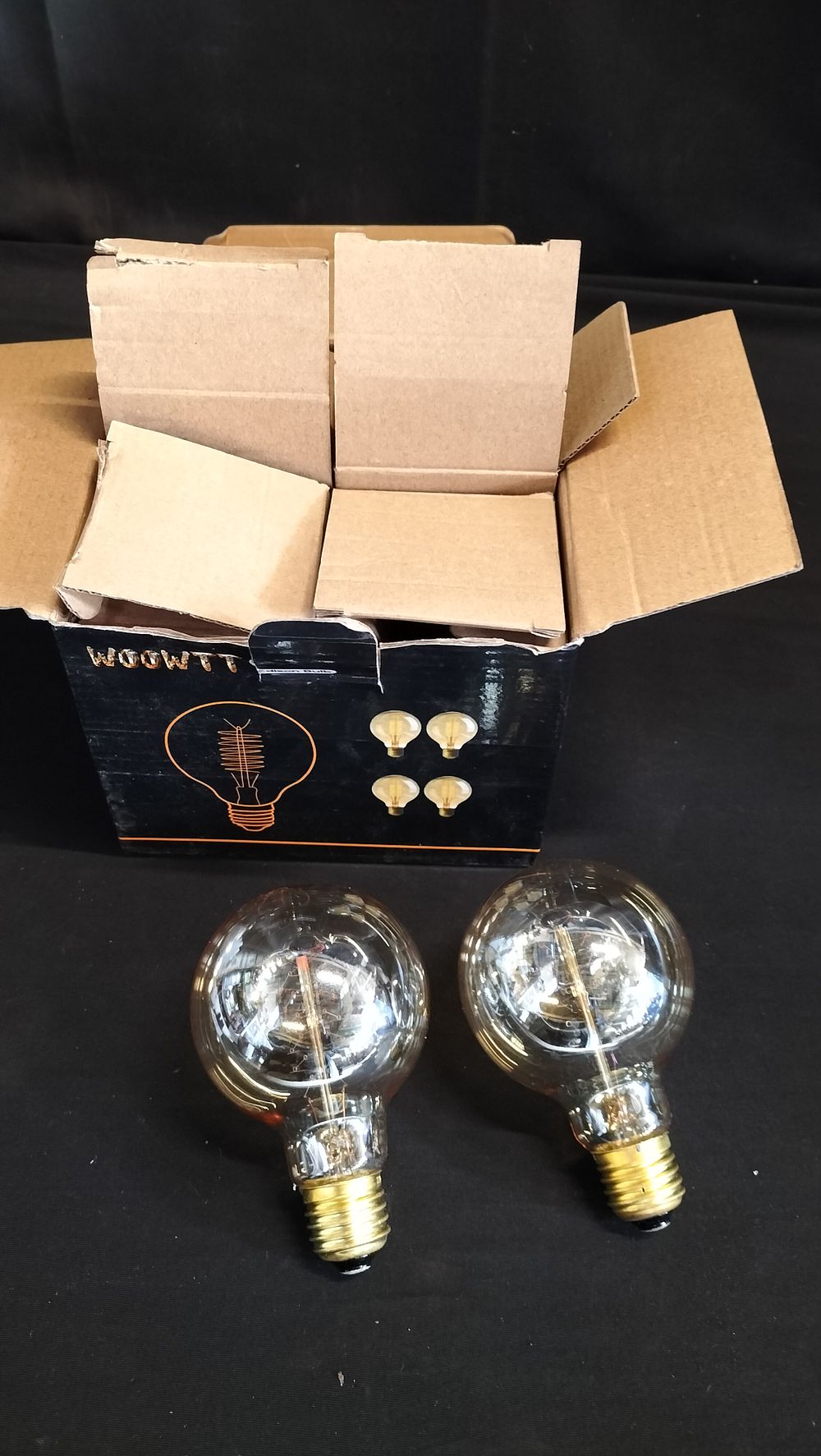 Lot 584: Pack of 4 Edison 25w light bulbs 