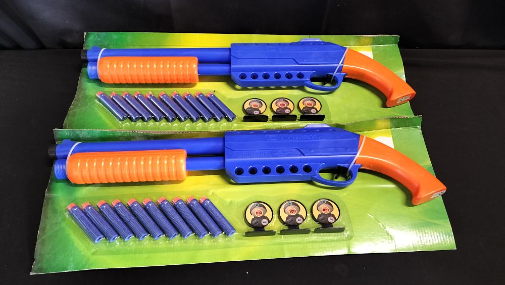 Lot 587: Two packs of Guns.  shotgun target practice with...