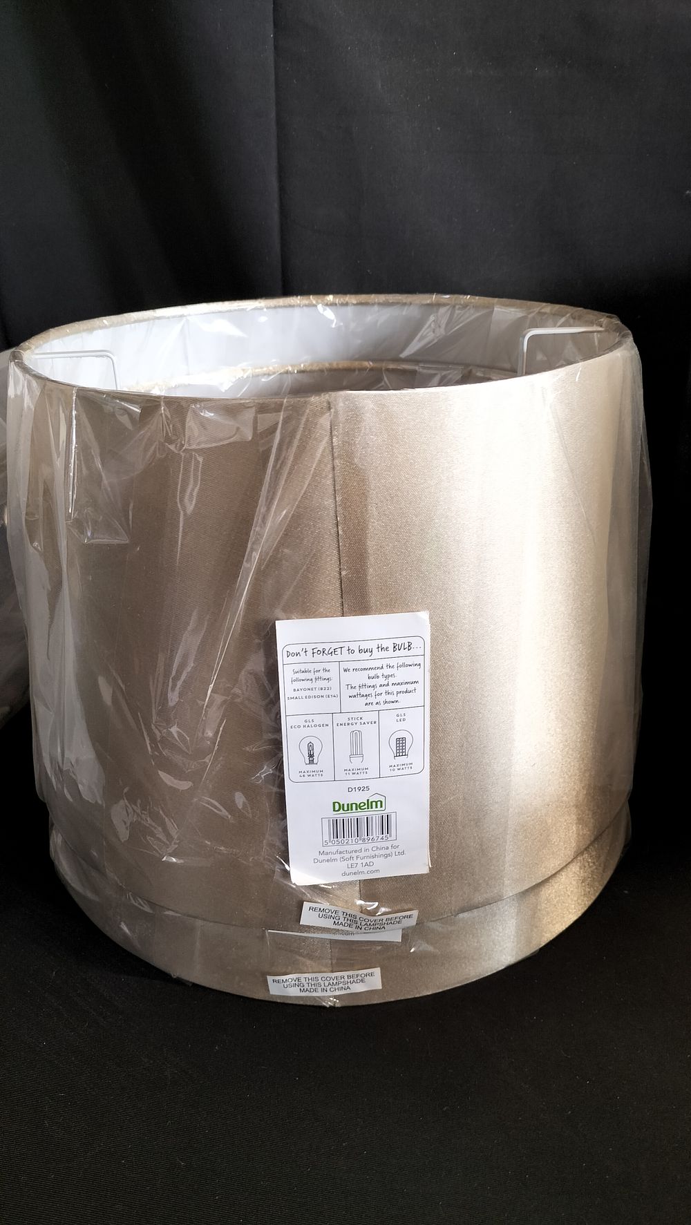Lot 601: Two Dunelm light shades in gold colour 